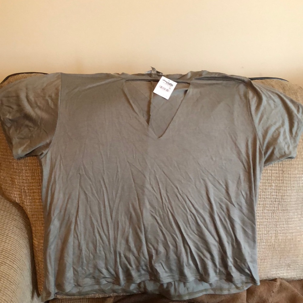 Nice NWT green cut out shirt.